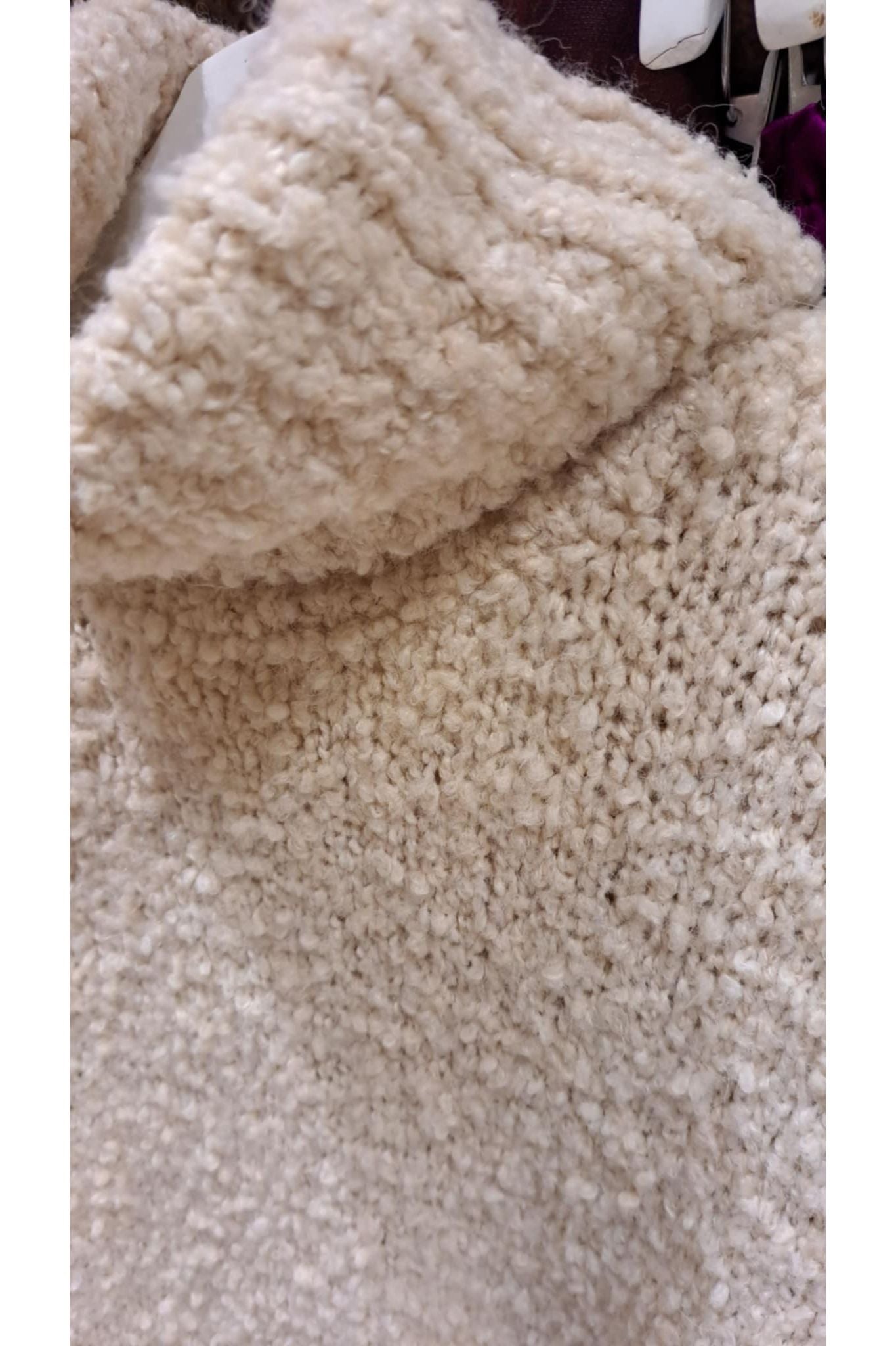 Mouwloze teddytrui ecru