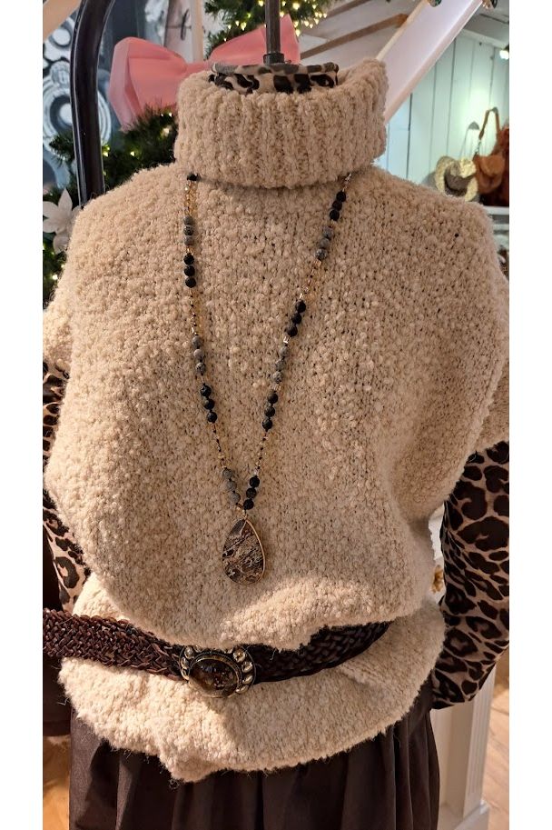 Mouwloze teddytrui ecru