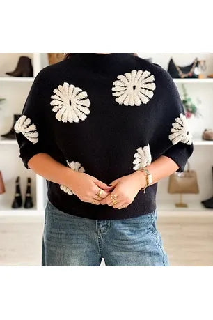 Zwarte pull met ecru bloemen