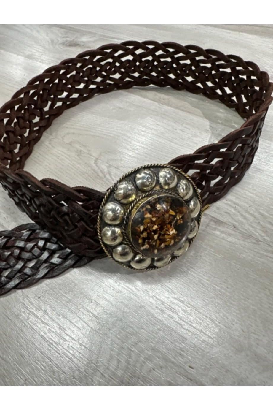 Donkerbruin gevlochten riem met statement gesp