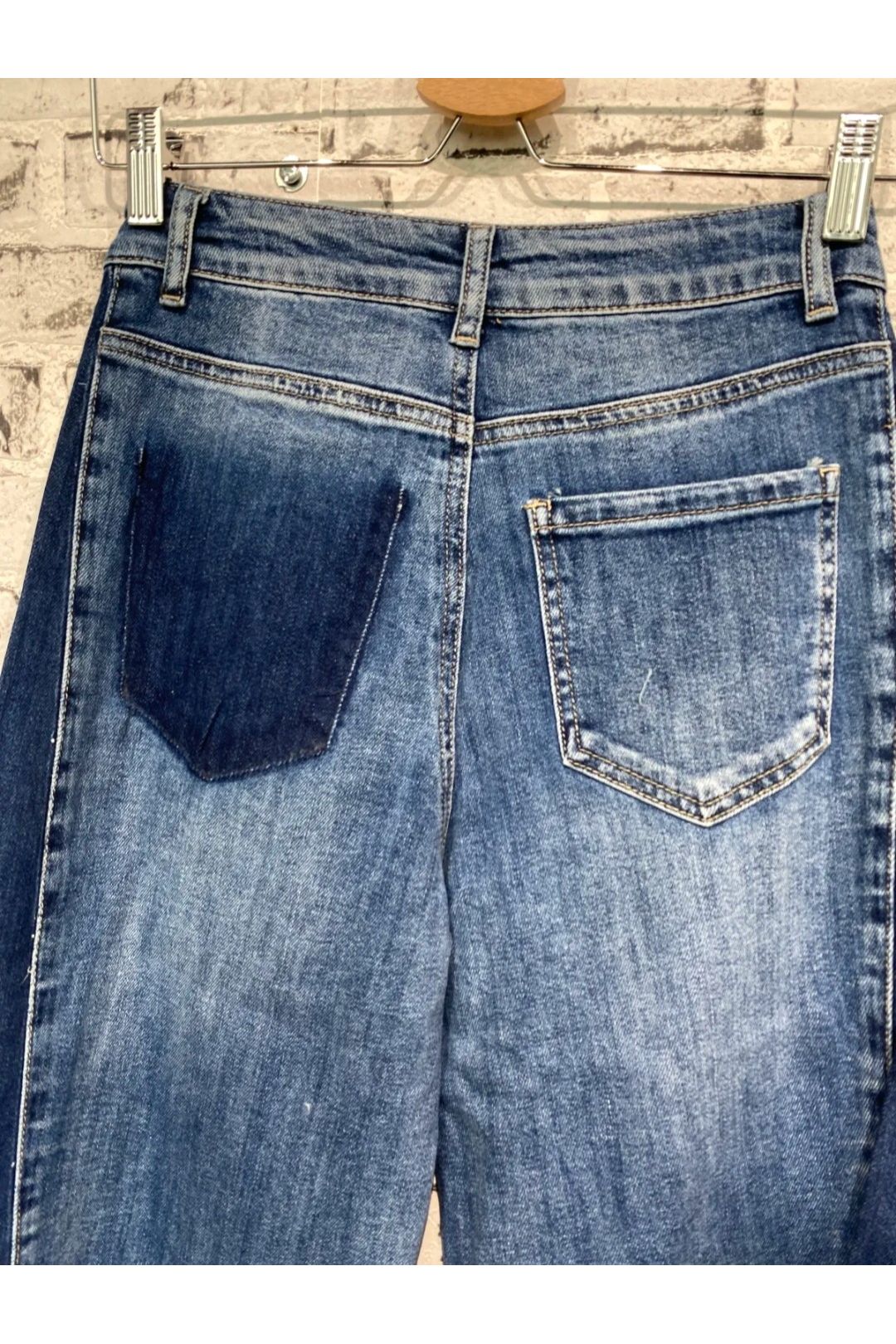 Wide leg jeans met patchwork details