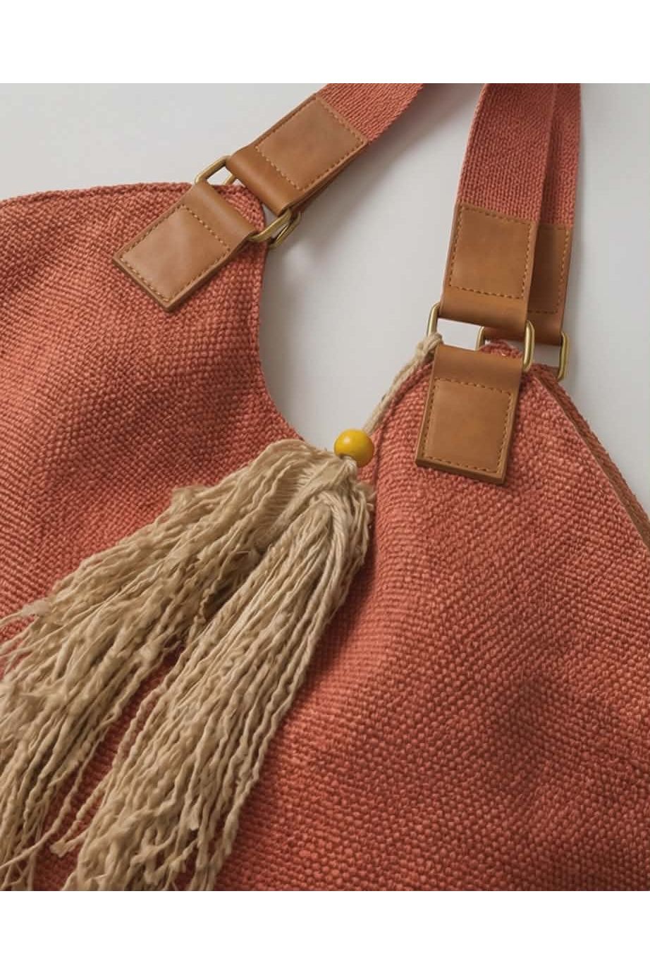 Coral jutte handtas met lederen details